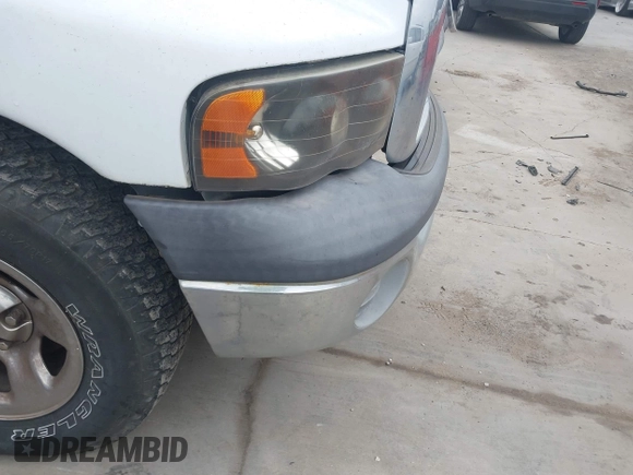 2002 Dodge 1500 z VIN 1D7HA16N62J201753, wystawiony jako IAAI lot #42400336 z przebiegiem 112 782 mil mil oraz . Historia ofert i sprzedaży dostępna na DreamBid. Obrazek 6.