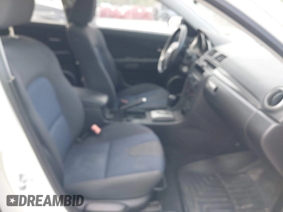2004 Mazda 3 s with VIN JM1BK143941129870, listed as a IAAI auction lot 42091265 with 198,408 mi miles and . Bid and sale history available at DreamBid. Image 5.