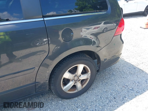 2011 Volkswagen Routan SE with VIN 2V4RW3DGXBR669762, listed as a IAAI auction lot 42693493 with 105,415 mi miles and . Bid and sale history available at DreamBid. Image 13.