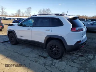 2019 Jeep Cherokee Trailhawk z VIN 1C4PJMBXXKD315140, wystawiony jako Copart lot #83298934 z przebiegiem 87 938 mil mil oraz Szkoda całkowita • Salvage title. Historia ofert i sprzedaży dostępna na DreamBid. Obrazek 2.