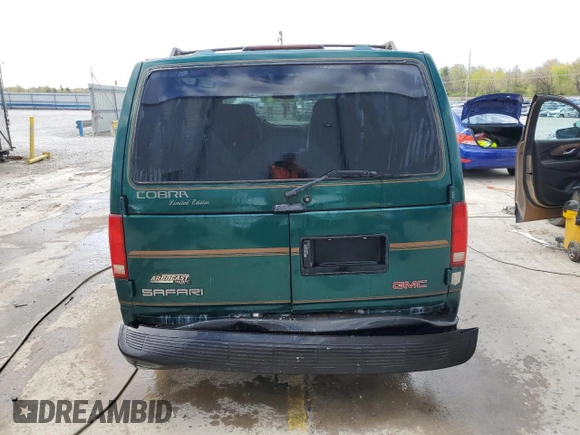 1998 GMC Safari z VIN 1GDDM19WXWB540497, wystawiony jako Copart lot #50780655 z przebiegiem 115 575 mil mil oraz Nie do naprawy. Historia ofert i sprzedaży dostępna na DreamBid. Obrazek 6.