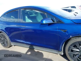 2022 Tesla Model X with VIN 7SAXCDE58NF341112, listed as a IAAI auction lot 41632491 with Not Provided miles and . Bid and sale history available at DreamBid. Image 13.