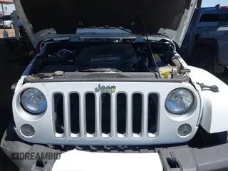 2016 Jeep Wrangler Unlimited Sahara with VIN 1C4BJWEG0GL126270, listed as a IAAI auction lot 42229364 with 50,847 mi miles and . Bid and sale history available at DreamBid. Image 10.