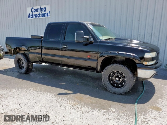 2002 Chevrolet Silverado 1500 LS with VIN 1GCEK19T12Z257038, listed as a Copart auction lot 56856265 with 205,764 mi miles and Clean Title. Bid and sale history available at DreamBid. Image 4.