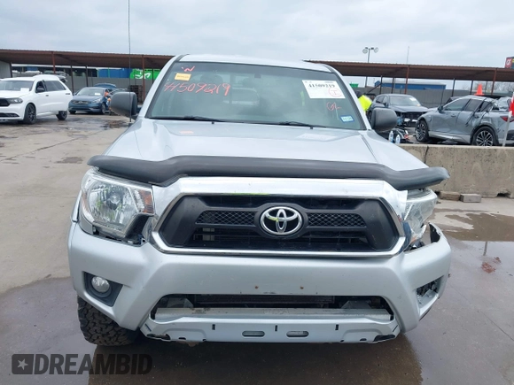 2013 Toyota Tacoma with VIN 5TFUU4EN1DX065356, listed as a IAAI auction lot 41509219 with 122,520 mi miles and . Bid and sale history available at DreamBid. Image 12.