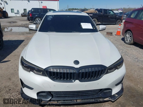 2019 BMW 3 Series 330i with VIN WBA5R1C5XKAJ99366, listed as a IAAI auction lot 41880445 with 48,052 mi miles and . Bid and sale history available at DreamBid. Image 12.