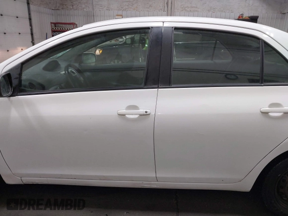 2007 Toyota Yaris with VIN JTDBT923X71058522, listed as a IAAI auction lot 42152157 with 161,050 mi miles. Bid and sale history available at carsss.com. Image 14.