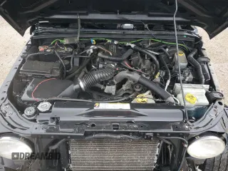 2008 Jeep Wrangler X z VIN 1J8FA24168L646281, wystawiony jako Copart lot #57689895 z przebiegiem 205 348 mil mil oraz Szkoda całkowita • Salvage title. Historia ofert i sprzedaży dostępna na DreamBid. Obrazek 11.
