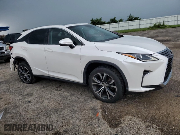 2017 Lexus RX 350 with VIN JTJBZMCA7H2019703, listed as a Copart auction lot 65020015 with 120,771 mi miles and Clean title. Bid and sale history available at DreamBid. Image 4.
