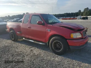 2001 Ford F-150 XL with VIN 2FTRX07LX1CA30894, listed as a Copart auction lot 74761224 with 0 mi miles and Salvage Title. Bid and sale history available at carsss.com. Image 4.