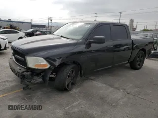2012 Ram 1500 Express with VIN 1C6RD6KT4CS156807, listed as a Copart auction lot 62300235 with 176,960 mi miles and Salvage title. Bid and sale history available at DreamBid. Image 1.