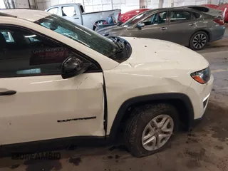 2018 Jeep Compass Sport with VIN 3C4NJCAB6JT124198, listed as a IAAI auction lot 41192196 with 104,557 mi miles. Bid and sale history available at carsss.com. Image 20.
