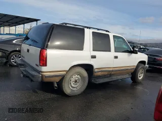 1999 GMC Yukon with VIN 1GKEK13RXXJ735870, listed as a Copart auction lot 44988505 with 150,557 mi miles and Salvage Title. Bid and sale history available at carsss.com. Image 3.