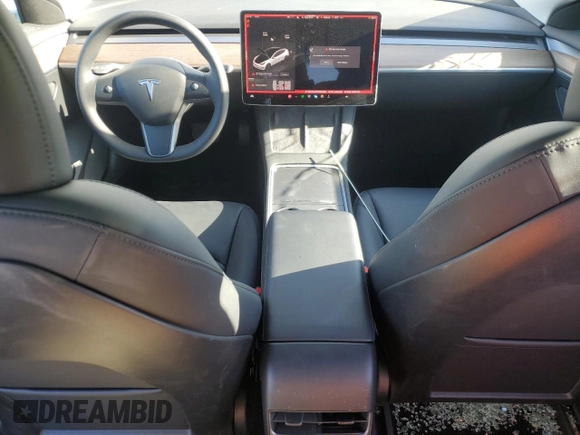 2023 Tesla Model 3 with VIN 5YJ3E1EA1PF556562, listed as a Copart auction lot 48413235 with 11,980 mi miles and Salvage Title. Bid and sale history available at DreamBid. Image 8.