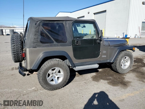 2003 Jeep Wrangler Sahara z VIN 1J4FA59S43P369233, wystawiony jako Copart lot #46517565 z przebiegiem 169 232 mil mil oraz Szkoda całkowita • Salvage title. Historia ofert i sprzedaży dostępna na DreamBid. Obrazek 3.