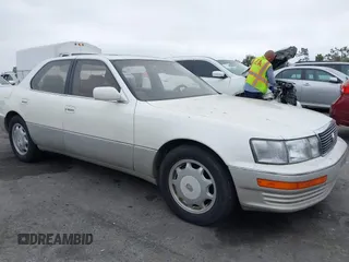 1993 Lexus LS z VIN JT8UF11E3P0171253, wystawiony jako IAAI lot #42141632 z przebiegiem 119 516 mil mil oraz . Historia ofert i sprzedaży dostępna na DreamBid. Obrazek 1.