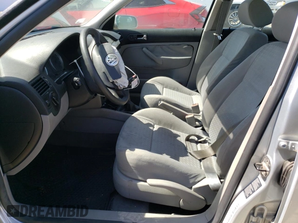 2004 Volkswagen Jetta GL z VIN 3VWRA69M54M007376, wystawiony jako Copart lot #72288984 z przebiegiem 91 687 mil mil oraz Szkoda całkowita • Salvage title. Historia ofert i sprzedaży dostępna na DreamBid. Obrazek 7.