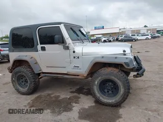2004 Jeep Wrangler X with VIN 1J4FA39S24P701806, listed as a IAAI auction lot 42218100 with 72,757 mi miles and . Bid and sale history available at DreamBid. Image 13.