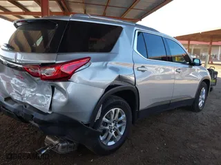 2018 Chevrolet Traverse LT Cloth with VIN 1GNERGKW2JJ250414, listed as a IAAI auction lot 41664779 with 77,214 mi miles. Bid and sale history available at carsss.com. Image 4.