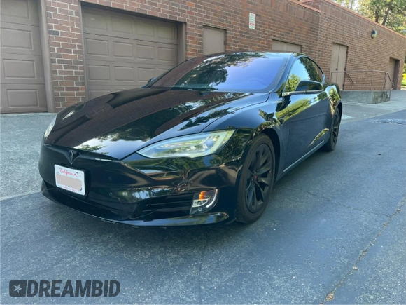 2017 Tesla Model S 60 with VIN 5YJSA1E15HF219286, listed as a Copart auction lot 57360515 with 44,520 mi miles and Salvage title. Bid and sale history available at DreamBid. Image 2.