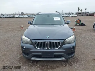 2013 BMW X1 28i with VIN WBAVM1C51DVW42577, listed as a IAAI auction lot 42029627 with 140,343 mi miles. Bid and sale history available at carsss.com. Image 13.