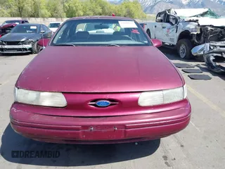 1993 Ford Taurus z VIN 1FACP52U4PG225521, wystawiony jako IAAI lot #42096535 z przebiegiem 76 808 mil mil oraz . Historia ofert i sprzedaży dostępna na DreamBid. Obrazek 12.