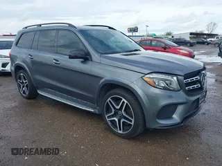 2018 Mercedes-Benz GLS 550 with VIN 4JGDF7DE7JB030242, listed as a IAAI auction lot 41909909 with 89,095 mi miles and . Bid and sale history available at DreamBid. Image 1.
