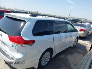 2014 Toyota Sienna LE with VIN 5TDJK3DC5ES081232, listed as a IAAI auction lot 41789629 with 397,033 mi miles and . Bid and sale history available at DreamBid. Image 13.