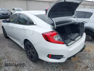 2019 Honda Civic Sport with VIN 2HGFC2F85KH512587, listed as a IAAI auction lot 41708347 with 63,895 mi miles and . Bid and sale history available at DreamBid. Image 3.