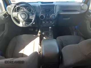 2016 Jeep Wrangler Unlimited Sport with VIN 1C4BJWDG3GL296463, listed as a Copart auction lot 49215375 with 115,080 mi miles and Salvage Title. Bid and sale history available at DreamBid. Image 8.