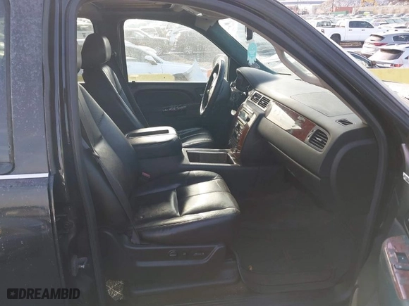 2014 Chevrolet Suburban LT with VIN 1GNSKJE70ER188902, listed as a IAAI auction lot 41208462 with 123,278 mi miles. Bid and sale history available at carsss.com. Image 5.