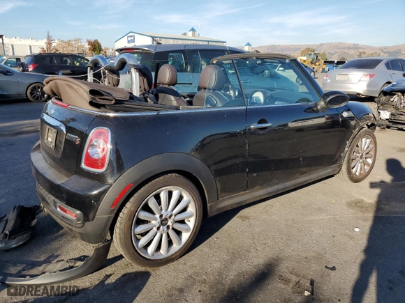 2012 MINI Cooper Convertible S with VIN WMWZP3C55CT550211, listed as a Copart auction lot 84225154 with 87,213 mi miles and Salvage Title. Bid and sale history available at carsss.com. Image 3.