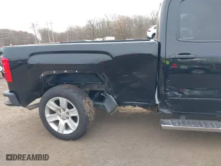 2016 GMC Sierra 1500 with VIN 1GTV2LEH9GZ421642, listed as a IAAI auction lot 40870826 with 105,326 mi miles. Bid and sale history available at carsss.com. Image 6.