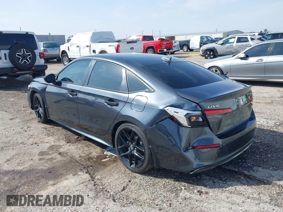 2024 Honda Civic Sport with VIN 2HGFE2F58RH526395, listed as a IAAI auction lot 41576275 with 14,692 mi miles and . Bid and sale history available at DreamBid. Image 3.