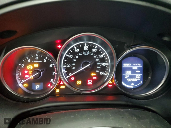 2016 Mazda CX-5 Sport with VIN JM3KE4BY9G0694709, listed as a Copart auction lot 55147555 with 98,900 mi miles and Salvage title. Bid and sale history available at DreamBid. Image 9.