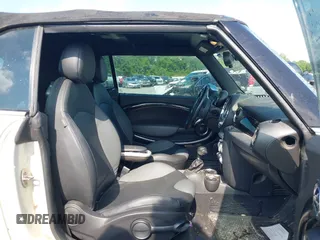 2010 MINI Convertible S with VIN WMWMS3C58ATY09098, listed as a IAAI auction lot 42149773 with 127,424 mi miles and . Bid and sale history available at DreamBid. Image 5.