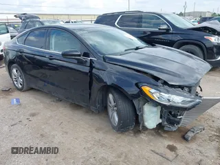 2018 Ford Fusion SE z VIN 3FA6P0H77JR164991, wystawiony jako IAAI lot #42224254 z przebiegiem 118 658 mil mil oraz . Historia ofert i sprzedaży dostępna na DreamBid. Obrazek 1.