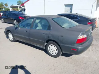 1997 Honda Accord Value with VIN 1HGCD5689VA182425, listed as a IAAI auction lot 41702660 with 208,005 mi miles and . Bid and sale history available at carsss.com. Image 3.