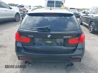 2014 BMW 3 Series 328i xDrive with VIN WBA3G7C57EKN37319, listed as a IAAI auction lot 41699235 with 93,671 mi miles and . Bid and sale history available at carsss.com. Image 16.