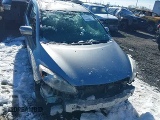 2014 Mazda 5 Sport with VIN JM1CW2BLXE0168119, listed as a IAAI auction lot 41527688 with 142,357 mi miles and . Bid and sale history available at DreamBid. Image 12.