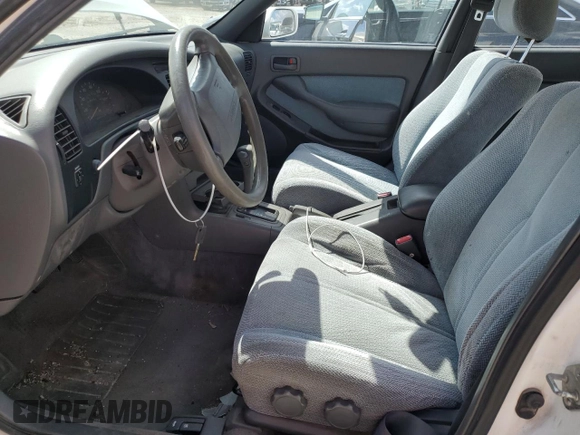 1994 Toyota Camry LE z VIN JT2SK12E0R0256694, wystawiony jako Copart lot #52819245 z przebiegiem 182 566 mil mil oraz Szkoda całkowita • Salvage title. Historia ofert i sprzedaży dostępna na DreamBid. Obrazek 7.