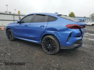 2020 BMW X6 M50i with VIN 5UXCY8C07L9B45473, listed as a Copart auction lot 73403164 with 0 mi miles and Salvage Title. Bid and sale history available at carsss.com. Image 2.