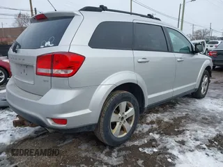 2012 Dodge Journey SXT with VIN 3C4PDCCG6CT135911, listed as a IAAI auction lot 41448632 with 179,440 mi miles and . Bid and sale history available at DreamBid. Image 4.