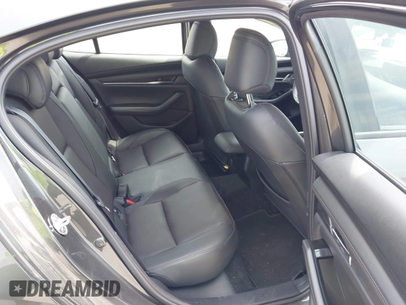 2023 Mazda 3 S Premium with VIN 3MZBPBDM3PM383238, listed as a IAAI auction lot 42477596 with 24,233 mi miles and . Bid and sale history available at DreamBid. Image 8.