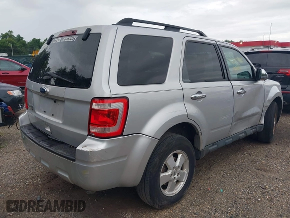 2012 Ford Escape XLT z VIN 1FMCU9D76CKA78378, wystawiony jako IAAI lot #42649925 z przebiegiem 282 992 mil mil oraz . Historia ofert i sprzedaży dostępna na DreamBid. Obrazek 13.