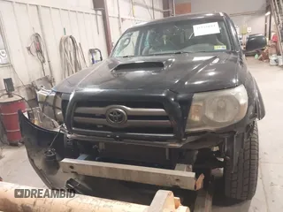 2009 Toyota Tacoma with VIN 3TMMU52N69M011591, listed as a IAAI auction lot 41941044 with 220,925 mi miles and . Bid and sale history available at DreamBid. Image 12.
