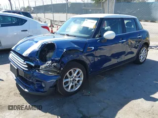 2015 MINI Hardtop 4 Door with VIN WMWXS5C50FT832438, listed as a IAAI auction lot 42632469 with 96,432 mi miles and . Bid and sale history available at DreamBid. Image 2.