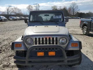 2000 Jeep Wrangler Sport with VIN 1J4FA49S4YP789348, listed as a Copart auction lot 50521365 with 0 mi miles and Salvage Title. Bid and sale history available at carsss.com. Image 5.