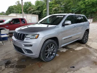 2018 Jeep Grand Cherokee High Altitude with VIN 1C4RJFCT8JC344110, listed as a Copart auction lot 60257065 with 94,917 mi miles and Salvage title. Bid and sale history available at DreamBid. Image 1.