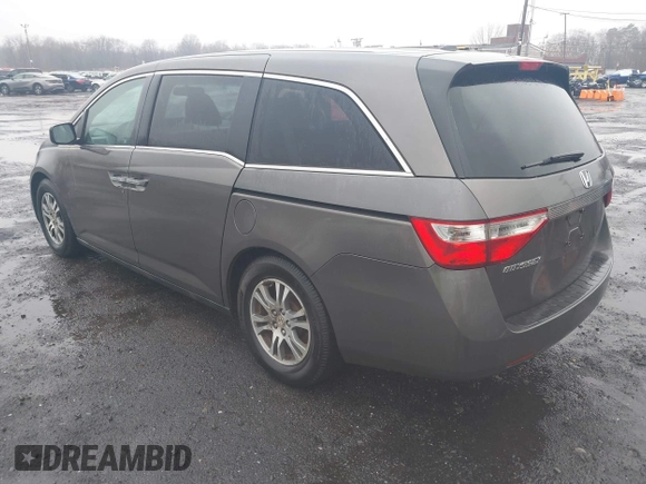 2012 Honda Odyssey EX-L with VIN 5FNRL5H64CB037689, listed as a IAAI auction lot 41857822 with 121,601 mi miles and . Bid and sale history available at carsss.com. Image 3.